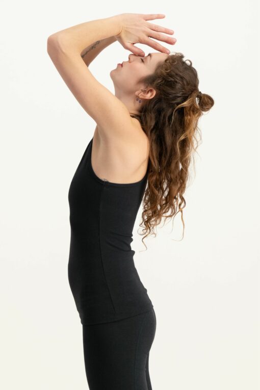 Surya dry fit yoga sport top - Urban Black - Urban Goddess yoga & active wear - model side